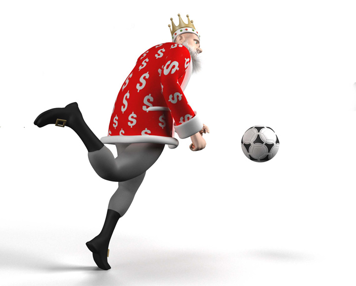 The King is about to kick the approaching soccer ball. Igra fuce. Football in southern Africa. Bet on the COSAFA Cup